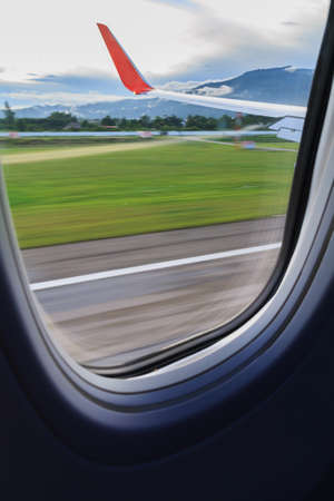 View of window from airplane on landing time.の写真素材