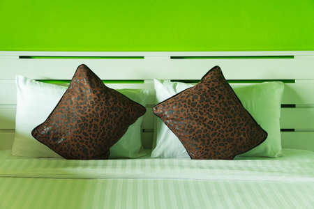 White pillows and Comfortable soft pillows on the bed.の写真素材