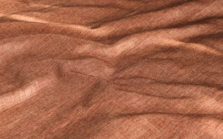 Copper-red creased material background or texture.の写真素材