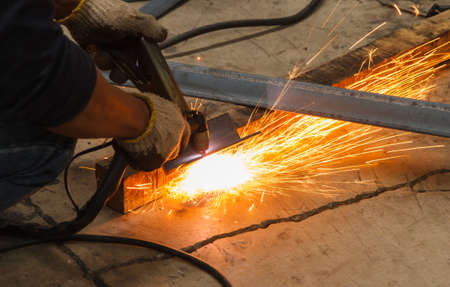 Manual Plasma Cutting Machine in Manufacturing Industry - Conditions Hazardous Working.の写真素材