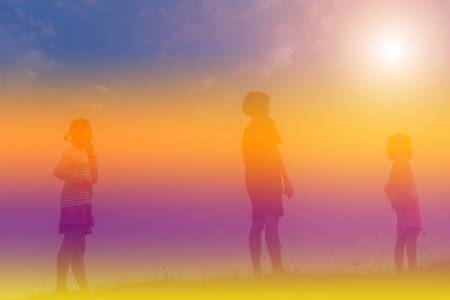 Children play in the evening.の写真素材