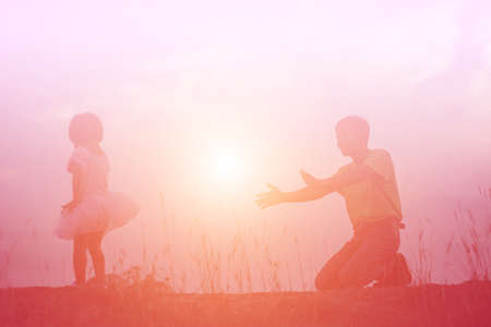 Playing in the evening with a girlの写真素材