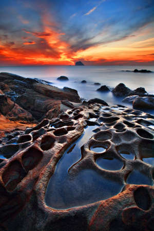 strange rock sunriseの写真素材