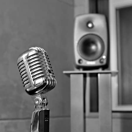 Retro microphone in a listening room to the monochrome imageの写真素材