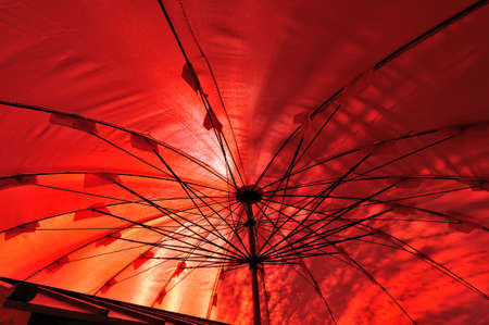 Under the red umbrellaの写真素材