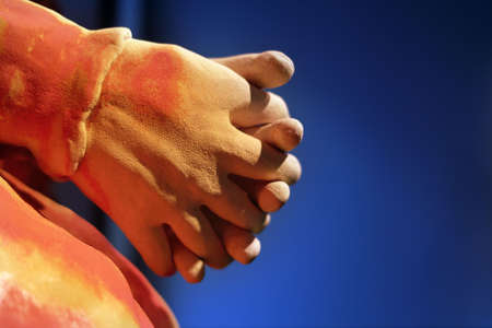 Meditation to shake hands with a blue backgroundの写真素材