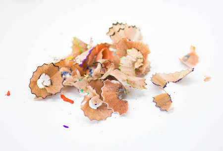 pencil shavings, Wooden colored pencil sharpening shavings pile on white isolated background, Color pencil shaves on a white paper, Pile of pencil's shavings isolated, Pencil shavings on a white backgroundの写真素材