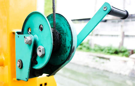 Green Belt Puller, Yellow Steel Column, steel roller with puller Wire Rope.の写真素材