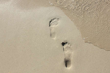 Wave of the sea on the sand beach with sunlight , for background, Sand on a beach, Greece for backgrounds for Catalogs, wallpaper, texturesの写真素材