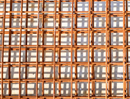 Steel wire mesh at construction site, Rebar for construction at Building site, Stacked rebar grids...
