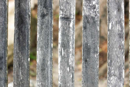 Old vintage wooden fence background vintage, Detail of an old and grey wood floor, Background texture old fence, dark wooden slatsの写真素材