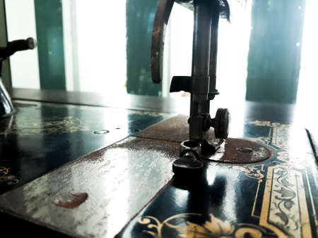 Close up - Old sewing machine, sewing machine and item of clothing, The old sewing machine. Vintageの写真素材