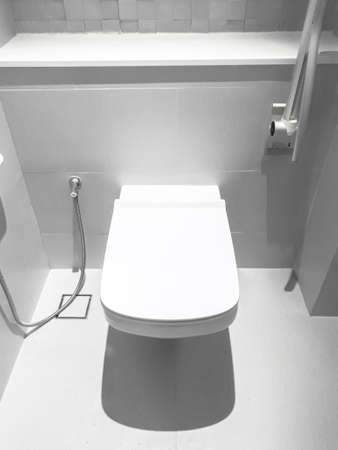 Toilet, Flushing Water, flush toilet, Closeup look at toilet, white toilet, White toilet in the bathroom, Top view of toilet bowlの写真素材
