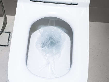 Toilet, Flushing Water, flush toilet, Closeup look at toilet, white toilet, White toilet in the...