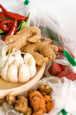 variety of seasoning ingredients on white backgroundの写真素材