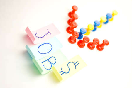 arrow sign pointing to a word JOBS - opportunityの写真素材