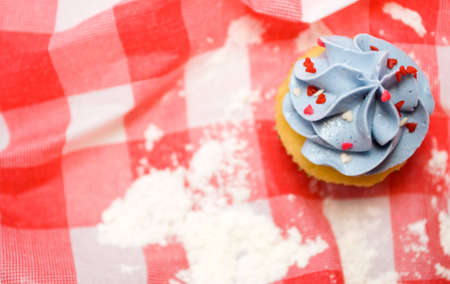 delicious cupcake on a table clothの写真素材
