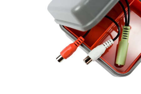 new and clean plastic tool box with audio cable plugs isolated on whiteの写真素材