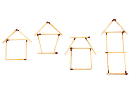various housing symbol made from matches isolated on whiteの写真素材