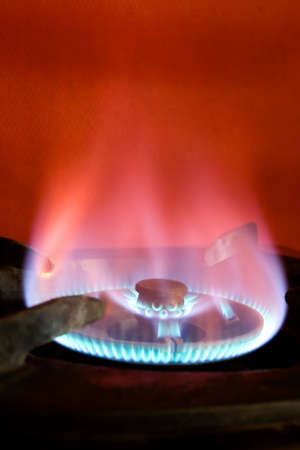 conceptual abstract portrait of flame on an old domestic stove.