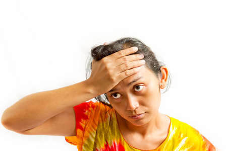 portrait of asian ethnic young adult female looking stress