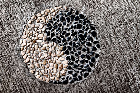 chinese symbol yin and yang made of stone