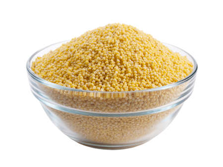 Bowl full of millet isolated on white background high angle view