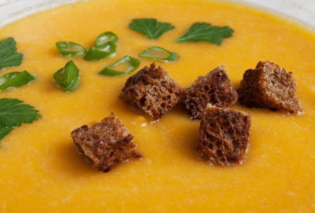 Pumpkin soup with crackers close up viewの写真素材