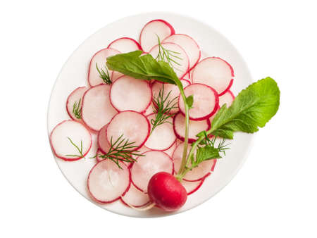 Slices of radish in a salad on plate isolated on whiteの写真素材