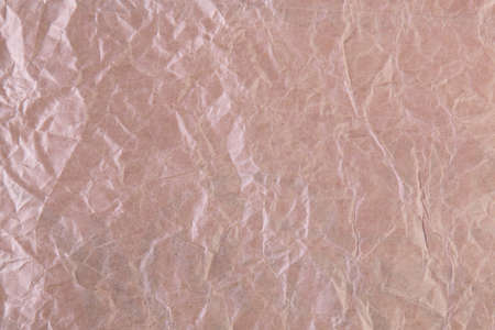 Craft paper brown crumpled textured background closeup packaging material