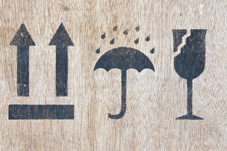 image close-up fragile symbol on wood