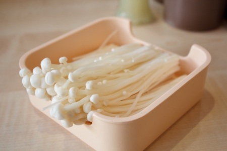 Enokitake ,The Golden Mushroom on dishの写真素材