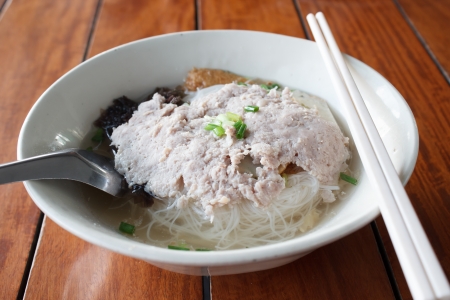 rice noodles soup with vegetables and porkの写真素材