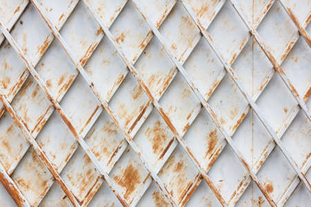 old metal door with rusty for texture backgroundの写真素材