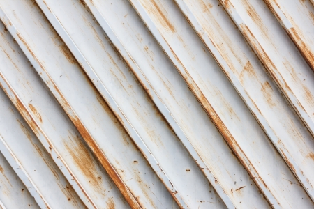 old metal door with rusty for texture backgroundの写真素材