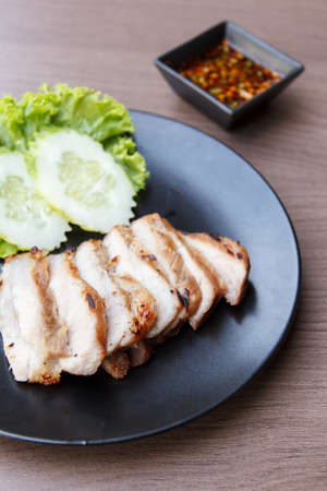 grilled pork neck and spicy sauceの写真素材