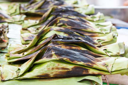 steamed fish with curry paste in banana leaves wrap  thai food の写真素材