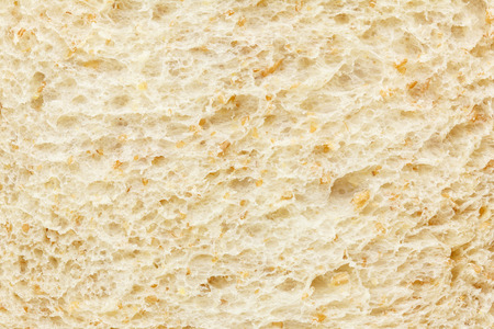 Whole wheat bread texture backgroundの写真素材