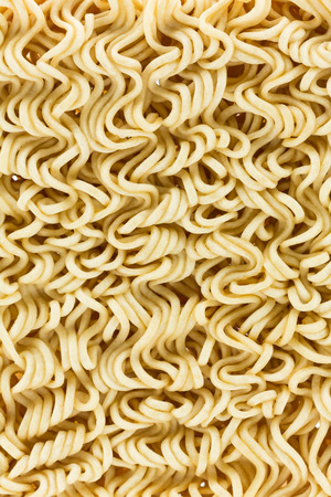 Closeup dry instant noodles backgroundの写真素材