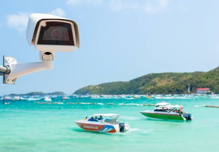 cctv camera at beach and sky backgroundの写真素材