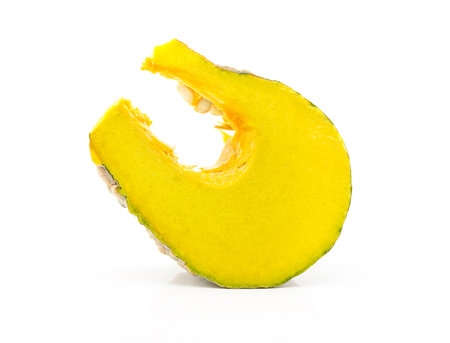 piece of raw thai pumpkin on white backgroundの写真素材