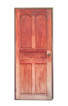 Old red wooden door isolated on a white backgroundの写真素材