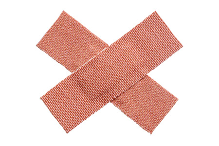 two fabric adhesive plasters isolated on white background