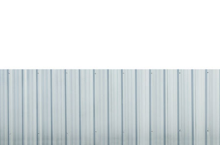 Silver metal fence sheet isolated on a white backgroundの写真素材