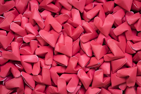 many red small paper hearts shaped background - valentine dayの写真素材