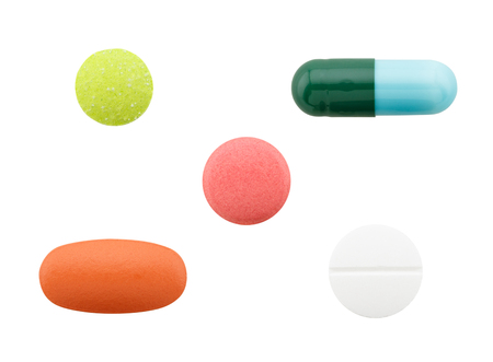set of colorful pills isolated on white backgroundの写真素材