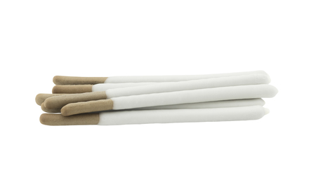 pile of biscuit sticks coated with white chocolate flavour isolated on white background