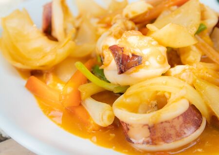 Close up of stir Fried Squid with Salted Egg Yolk, Thai Seafood