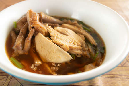 noodles soup with chicken in the bowl