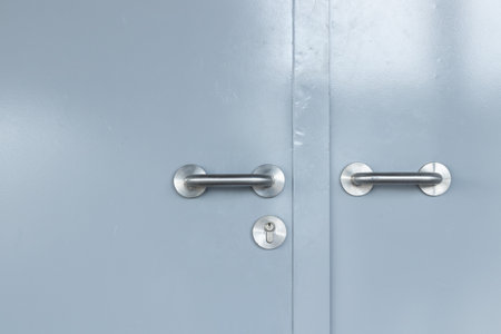 stainless aluminium handles on grey steel doorの写真素材